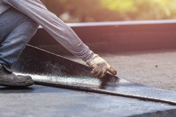 Professional Basement Waterproofing technician working in Troutdale, OR